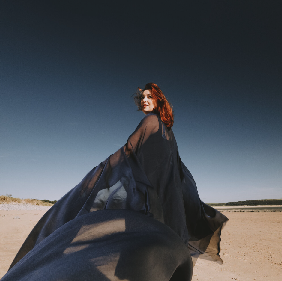 Caitlin Lavagna on a beach